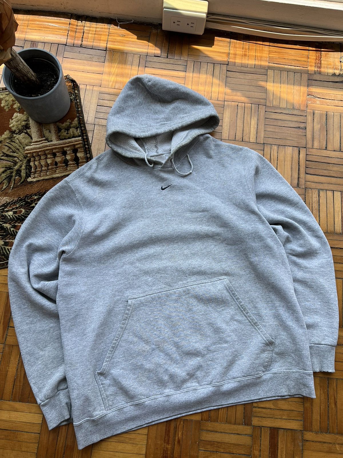 Nike hoodie small swoosh in middle best sale