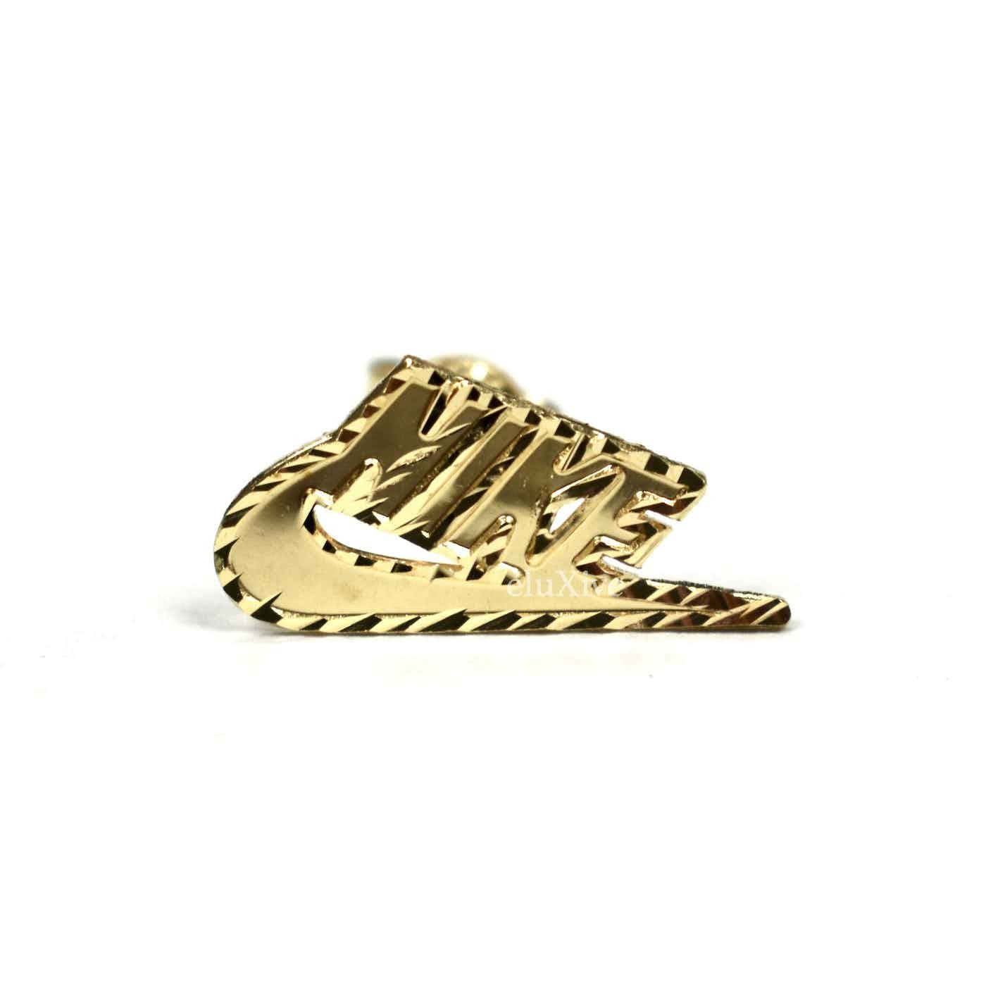 Nike gold earrings hotsell